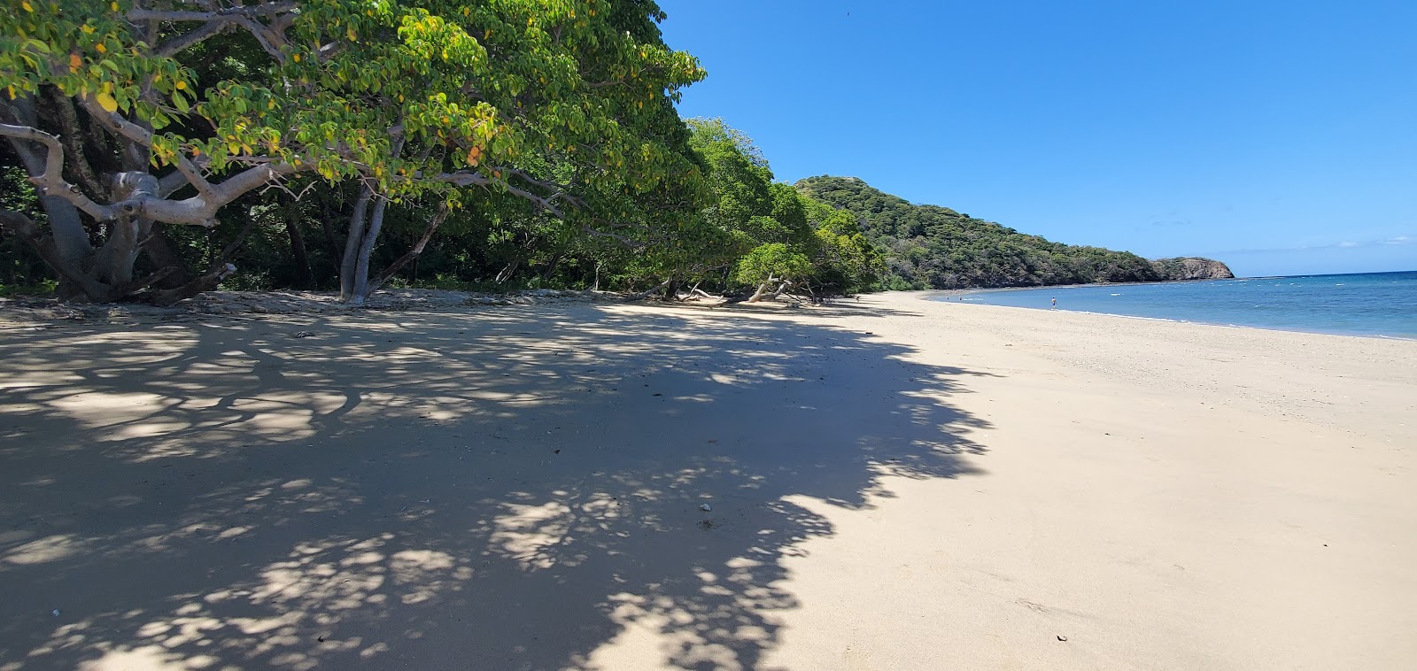 Foto di Tapustxunya Beach sorretto da scogliere