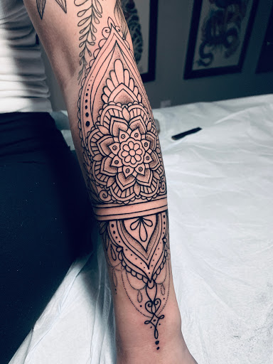 Explore tribal back tattoo ideas, creative tattoo ideas in West Yarmouth, available at Spilt Milk Gallery
