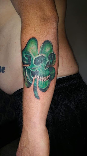 Explore skull cover up tattoo ideas, creative tattoo ideas in Greenwood, available at Emerald City Tattoos