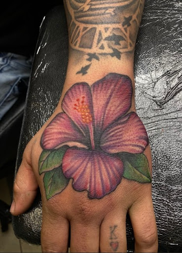 Explore money bag tattoo ideas, creative tattoo ideas in Passaic, available at District 36 Tattoo Parlor