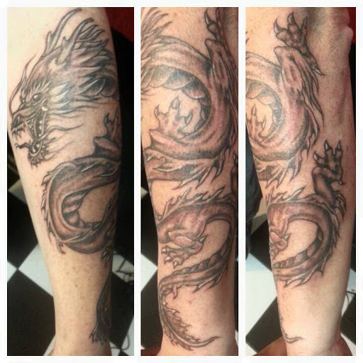 Explore upper back tattoo cover up ideas, creative tattoo ideas in Jacksonville, available at Cover Up Tattoos