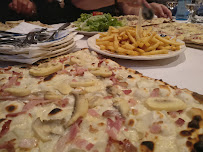 Tarte flambée du Restaurant de spécialités alsaciennes La Couronne de Roeschwoog - Flammkueche Restaurant à Rœschwoog - n°7