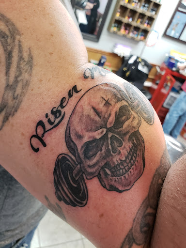 Explore filmmaker tattoo ideas, creative tattoo ideas in Enid, available at Culture Tattoo