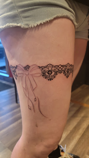 Explore male inner bicep tattoo ideas, creative tattoo ideas in Kalispell, available at Swindler Ink