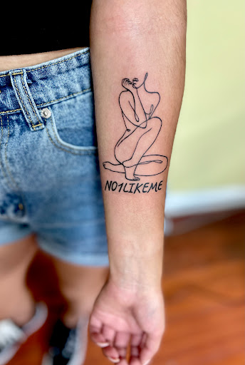 Explore sign language tattoo ideas, creative tattoo ideas in Garden Grove, available at Anna Hang Tattoo