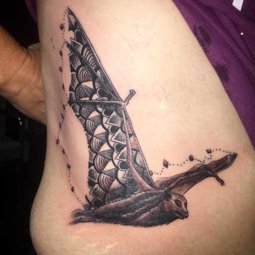 Explore trolls tattoo ideas, creative tattoo ideas in Louisburg, available at Lewter Tattoos and Piercing