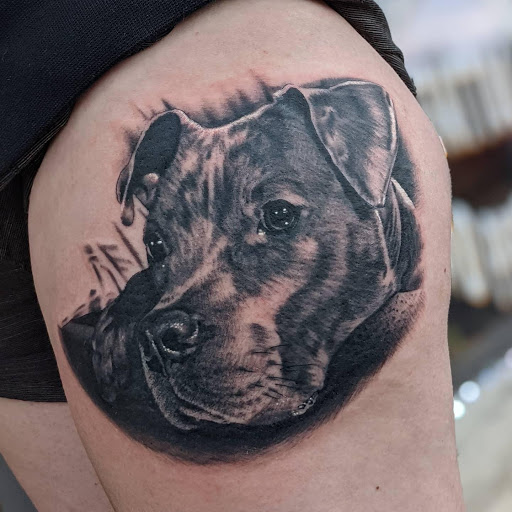 Explore charm tattoo ideas, creative tattoo ideas in Lake Villa, available at Eternal Tiger Tattoo