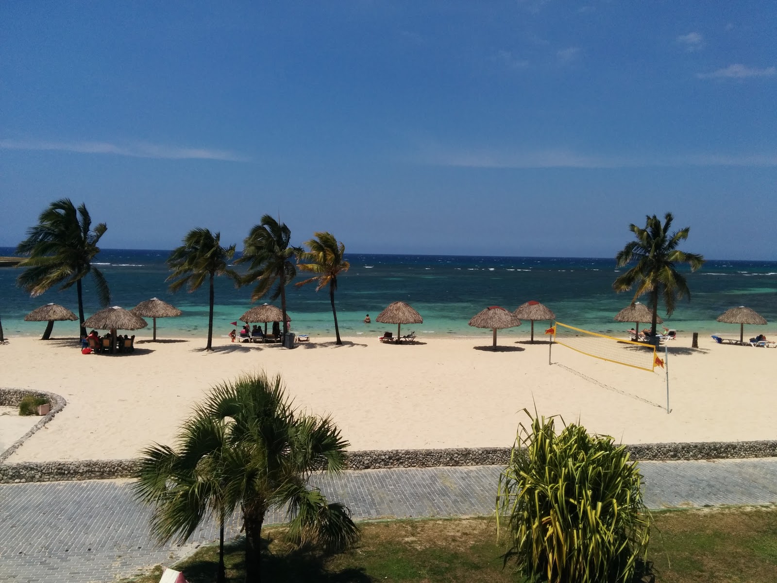 Foto de Playa Habana con arena brillante superficie