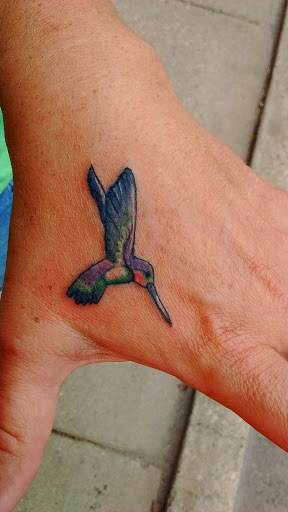 Explore beautiful female tattoo ideas, creative tattoo ideas in Decatur, available at Exclusive Ink Tattoos & Body Piercings 22nd & Wood
