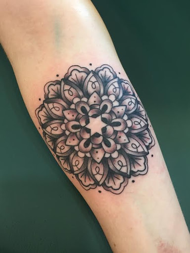 Explore blue rose tattoo ideas, creative tattoo ideas in Boulder, available at Rising Tide Tattoo Emporium