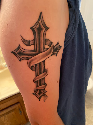 Explore tattoo ideas behind the ear tattoos, creative tattoo ideas in Cincinnati, available at Inkflow Tattoo Studio