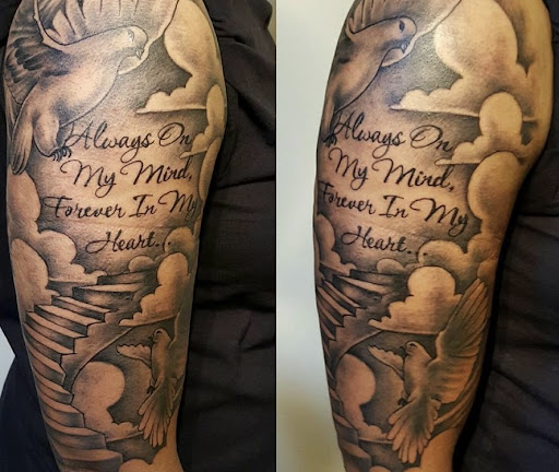 Explore mirrored tattoo ideas, creative tattoo ideas in Albany, available at Tat Jones Ruthless Tattoos L.L.C.