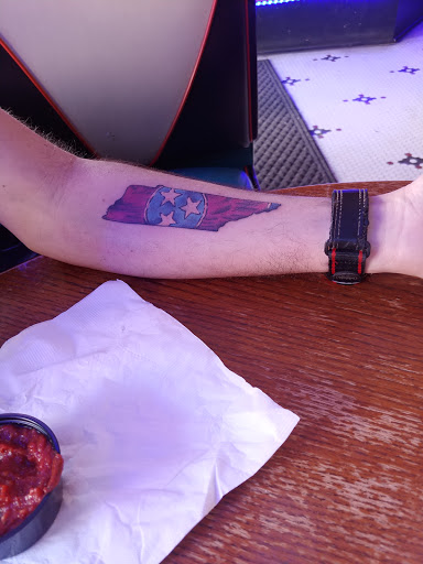 Explore cancer ribbon tattoo ideas, creative tattoo ideas in Elizabethton, available at Ink Therapy