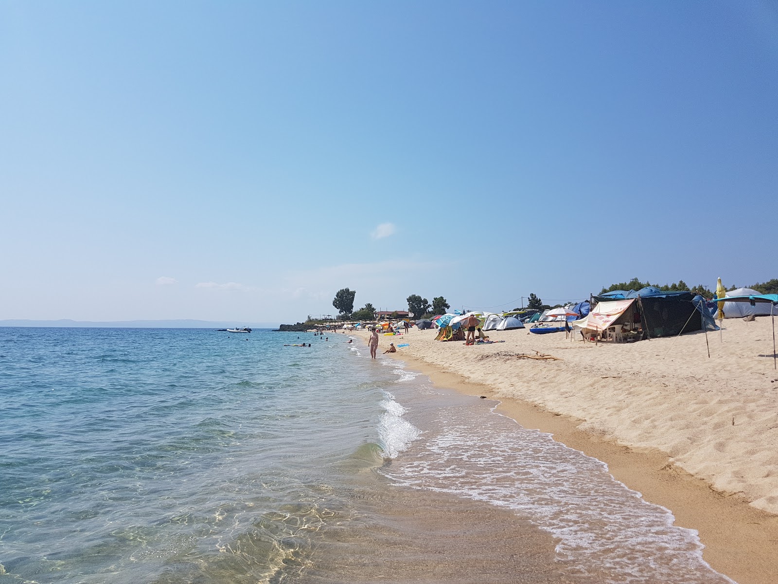 Photo of Tristinika beach with long straight shore