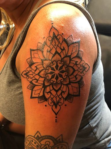 Explore hot female tattoo ideas, creative tattoo ideas in Alamosa, available at The Shop Tattoo & Comics