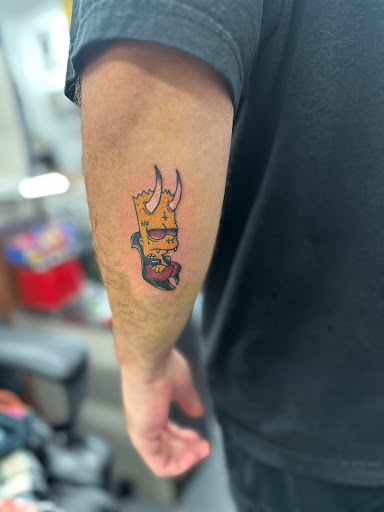 Explore spine tattoo ideas for females, creative tattoo ideas in New Carlisle, available at Reckless Temptations