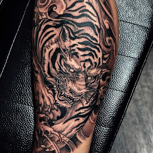 Explore tattoo ideas for young guys, creative tattoo ideas in Saint Paul, available at Supreme Art Of War Inc