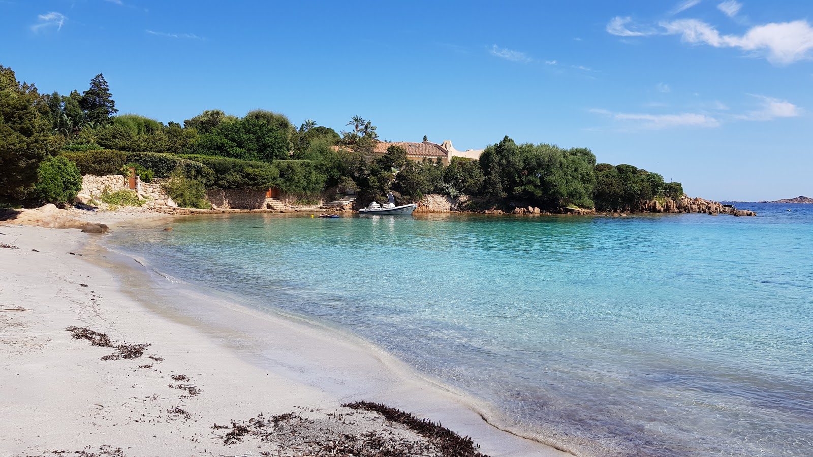 Photo of Spiaggia Piccolo Romazzino with bright sand surface