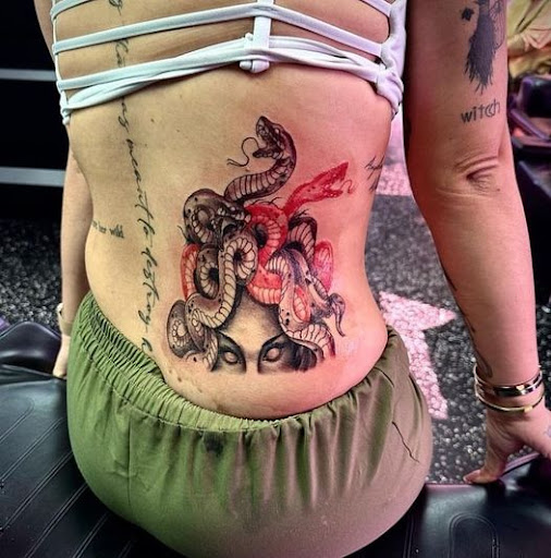 Explore nicki minaj tattoo ideas, creative tattoo ideas in Fort Myers, available at Loyal 2 The Coil Tattoos & Piercings (Edison Mall Location Entrance F)