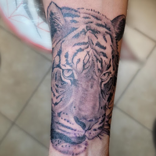 Explore gay couple tattoo ideas, creative tattoo ideas in Birmingham, available at Cloud 9 Tattoo & Piercing STUDIO