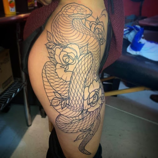 Explore charlie brown tattoo ideas, creative tattoo ideas in El Paso, available at Pumping Ink Tattoo Parlor