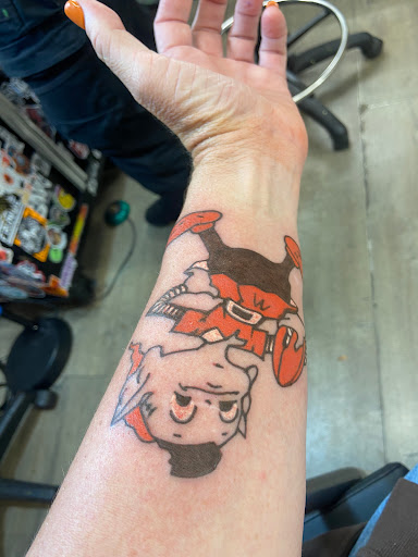 Explore monogram tattoo ideas, creative tattoo ideas in Cleveland, available at Red Lion Tattoo Cleveland