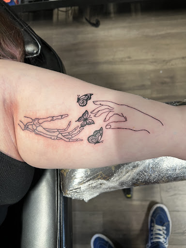 Explore religious tattoo sleeve ideas, creative tattoo ideas in Cheyenne, available at The T.R.I.B.E. Zoo, LLC Tattoo