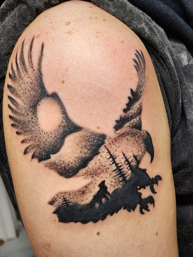 Explore knee cap tattoo ideas, creative tattoo ideas in Columbus, available at Lions Mane Tattoo and Piercing