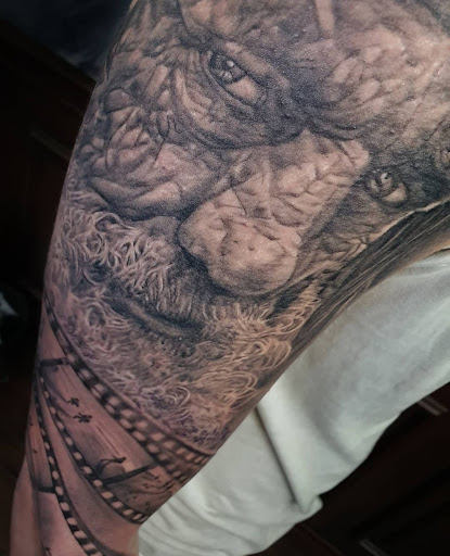 Explore men's dark tattoo ideas, creative tattoo ideas in Ambler, available at Tattoo GalaxyAmbler Piercing & Custom Tattoos