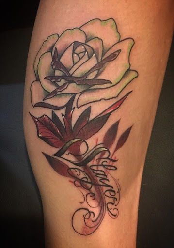 Explore tattoo ideas for behind ear, creative tattoo ideas in San Diego, available at Sideshow Tattoo and Piercing