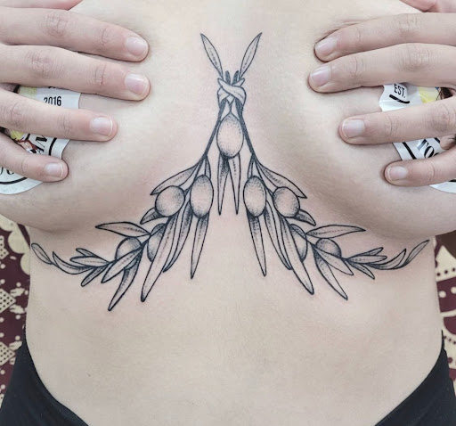 Explore tattoo filler ideas for men, creative tattoo ideas in Kenosha, available at Kenosha Tattoo Company