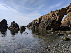 The Window Beach'in fotoğrafı dağlarla çevrili
