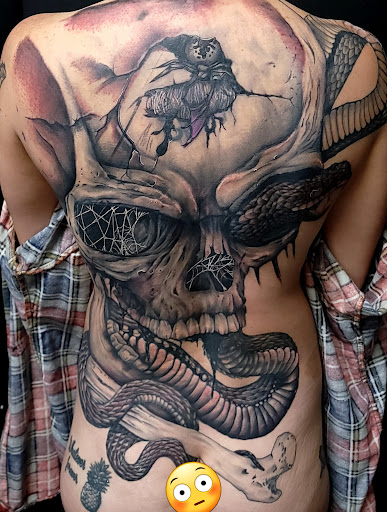 Explore father tattoo ideas, creative tattoo ideas in Largo, available at Alchemy Tattoos and Body Piercings