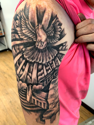 Explore flower vine tattoo ideas, creative tattoo ideas in Seymour, available at American Gypsy Tattoo Corp.