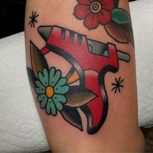 Find under the breast tattoo ideas for your next unique tattoo in Lakeland at Black Swan Tattoo