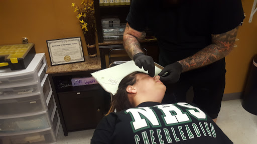 Explore tattoo ideas for guys ribs, creative tattoo ideas in Roanoke, available at Asylum Studios