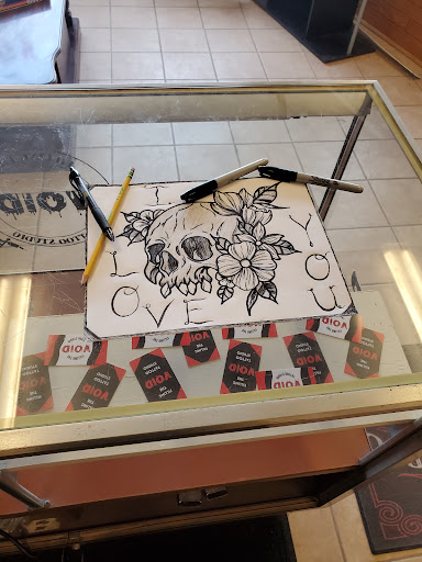 Explore men's ring tattoo ideas, creative tattoo ideas in Rhinelander, available at Filling The VOID Tattoo Studio