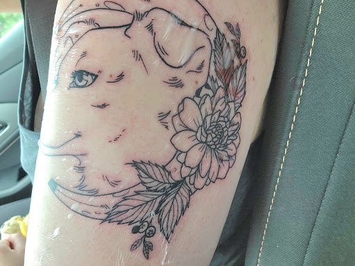 Explore tattoo 3/4 sleeve ideas, creative tattoo ideas in Fargo, available at The Inked Huntress Tattoo Studio