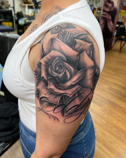 Explore book lovers tattoo ideas, creative tattoo ideas in Spokane, available at DZ INK TATTOO PARLOR