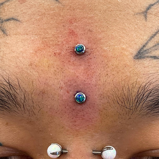 Explore lifeguard tattoo ideas, creative tattoo ideas in Petaluma, available at Blue Lotus (Professional Piercing and Body Art)