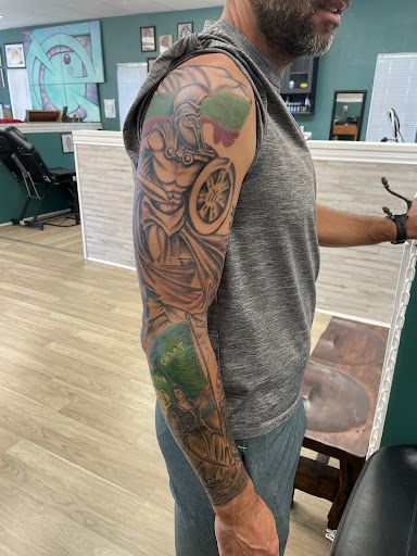 Find under the breast tattoo ideas for your next unique tattoo in Colorado Springs at Empire Tattoo Co.