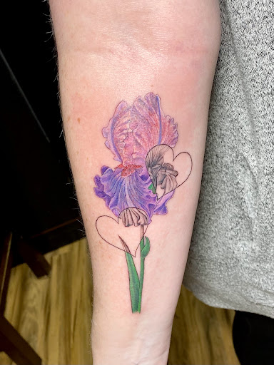 Explore parkinson's tattoo ideas, creative tattoo ideas in Powell, available at Elysium Body Enhancements