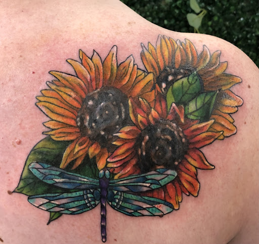 Explore flower finger tattoo ideas, creative tattoo ideas in Rowlett, available at Fresh Image Tattoo Studios