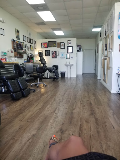 Explore small patchwork tattoo ideas, creative tattoo ideas in Fort Myers, available at Tiger Lotus Tattoo and Piercing