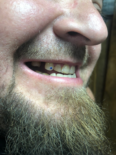 Explore mens behind the ear tattoo ideas, creative tattoo ideas in Bridgeport, available at Breaking skin tattoo and body piercing