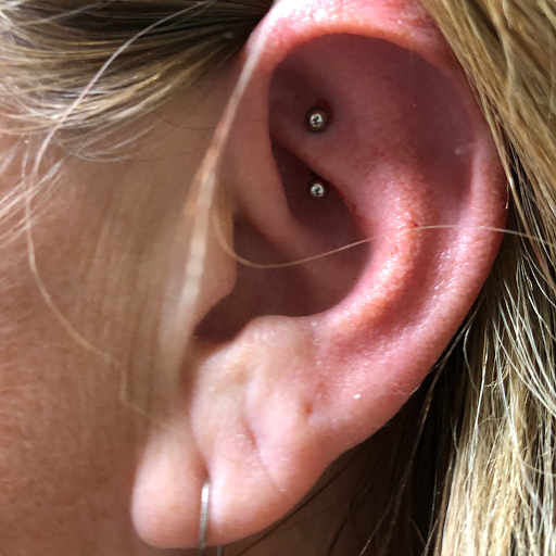 Explore female side tattoo ideas, creative tattoo ideas in Springfield, available at Tattoo Royale