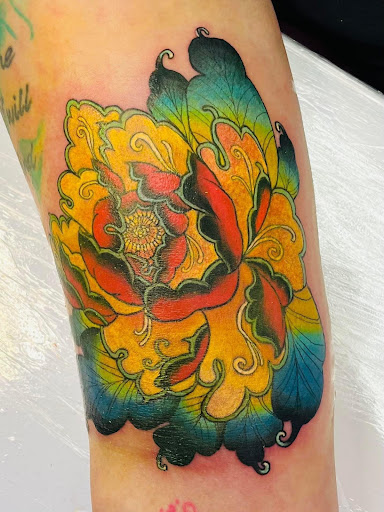 Explore laugh now cry later tattoo ideas, creative tattoo ideas in Sioux City, available at Inkspired Atelier
