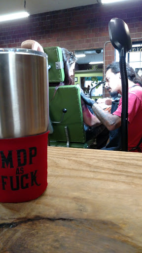 Explore red string tattoo ideas, creative tattoo ideas in Lincoln, available at Seven Seas Tattoo