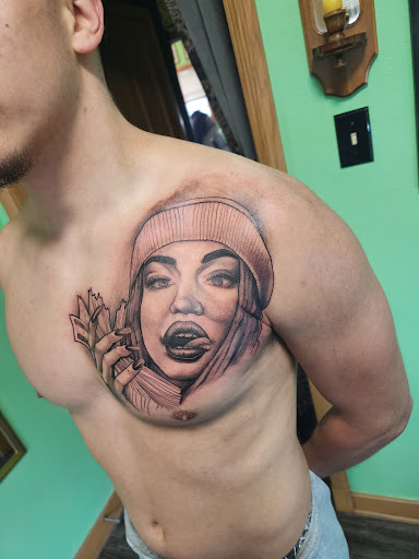 Find tattoo ideas about strength for your next unique tattoo in Galena at Emerald Buddha Tattoo