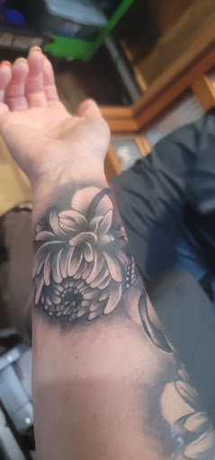 Explore robin tattoo ideas, creative tattoo ideas in Greensboro, available at Boss Lady Piercings & Tattoos